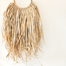 Coastal bohemian, boho, natural raffia wall hanging. natural wall art style. Unique, handcrafted Bali style home decor with rustic earthy textures. Unique wall decor.