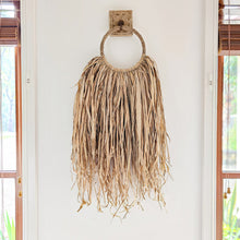 Coastal bohemian, boho, natural raffia wall hanging. natural wall art style. Unique, handcrafted Bali style home decor with rustic earthy textures. Unique wall decor.