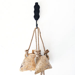 Matte black wall hooks with a carved design. Ideal for styling in your home entry, loungeroom, laundry, and more. Home decor for boho bohemian coastal interiors. Wall decor, natural wall decor for natural wall art hangings.