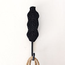 Matte black wall hooks with a carved design. Ideal for styling in your home entry, loungeroom, laundry, and more. Home decor for boho bohemian coastal interiors. Wall decor, natural wall decor for natural wall art hangings.