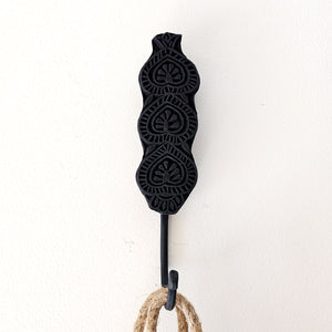 Matte black wall hooks with a carved design. Ideal for styling in your home entry, loungeroom, laundry, and more. Home decor for boho bohemian coastal interiors. Wall decor, natural wall decor for natural wall art hangings.