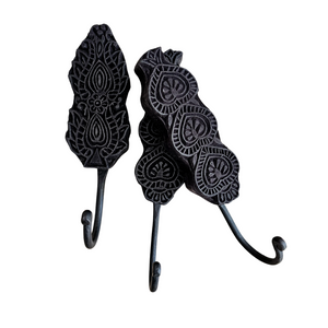 Matte black wall hooks with a carved design. Ideal for styling in your home entry, loungeroom, laundry, and more. Home decor for boho bohemian coastal interiors. Wall decor, natural wall decor for natural wall art hangings.