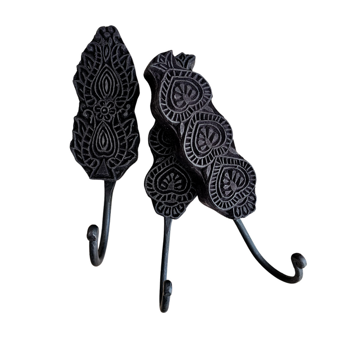Matte black wall hooks with a carved design. Ideal for styling in your home entry, loungeroom, laundry, and more. Home decor for boho bohemian coastal interiors. Wall decor, natural wall decor for natural wall art hangings.