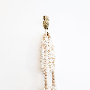Brass Pineapple wall hook for coastal boho inspired home interior 