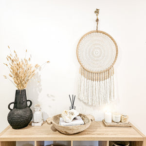 Iris round dreamcatcher Wall Hanging large in natural tone macrame cotton and wood beads. Perfect for coastal boho inspired home interior aesthetic. Wall statement piece.