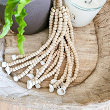 Mini wooden bead wall tassel. Decor tassel. Natural hamdcrafted wall art decor for coastal boho, farmhouse home decor. Home interior decor for coastal boho styles.