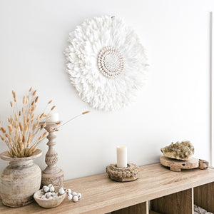 Soft white Feather and shell wall juju art. Natural wall hanging for a Coastal boho, Bohemian Home aesthetic. Wall decor art with soft textures and shell design in the center. Large unique wall decor.
White Feather Juju. 