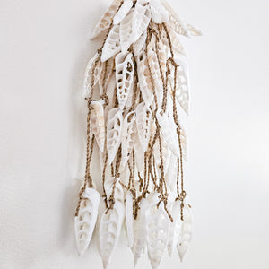 White shell tassel for coastal bohemian, boho wall decor. Handcrafted natural home decor