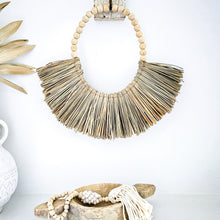 Amari wooden bead and natural seagrass wall hanging decor, coastal boho, bohemian home decor. Coastal boho home interior aesthetic. Natural wall art decor
